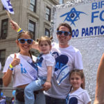 Elizabeth and Ira Savetsky with their two daughters at the 2019 Parade.