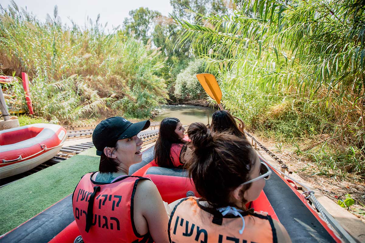 Birthright Israel participants kayaking in the Jordan river.