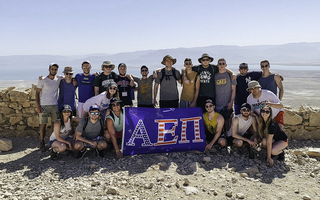 Cooper Myers with a group of his AEPi fraternity brothers on top of Masada on Birthright Israel in 2019