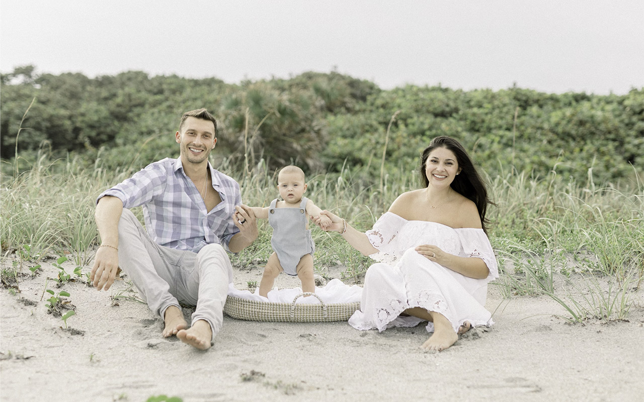 Birthright Israel alumni, and stars of 90 Day Fiancé, Loren and Alexei Brovarnik with their son Shai on the beach