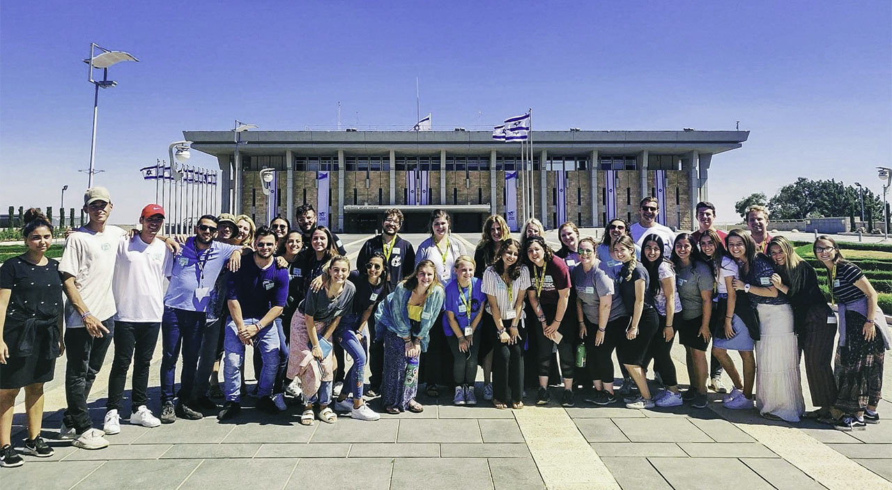 Max Gutnick with her Birthright Israel group in front of the Knesset in 2019