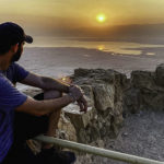 Ethan Bettinger enjoying the sunrise on Masada during his 2021 Birthright Israel trip