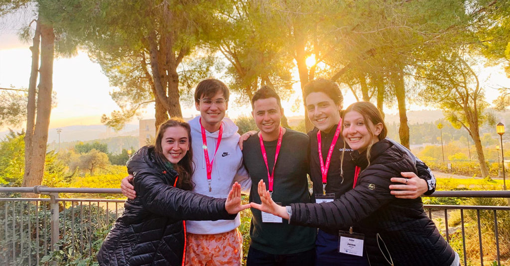 Birthright Israel participant Trudi Fleischman with her group at sunset in Jerusalem