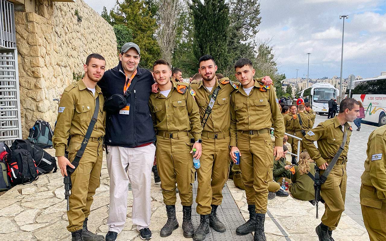 2022 Birthright Israel alumnus Jacob Babbin with Mifgash from his trip outside Mt. Herzl