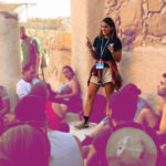 Birthright Israel Tour Educator Noa Tadmor lecturing a group of young Jews