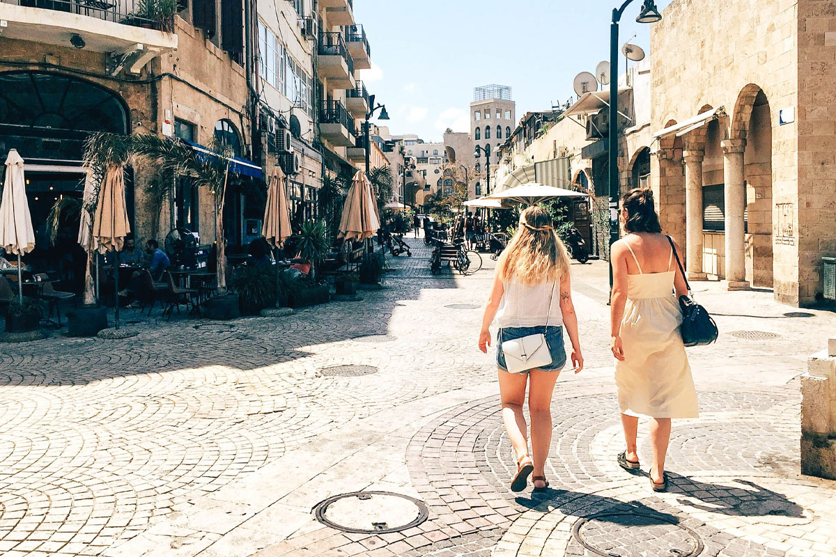 Madeline Beard and a fellow Birthright Israel participant walking